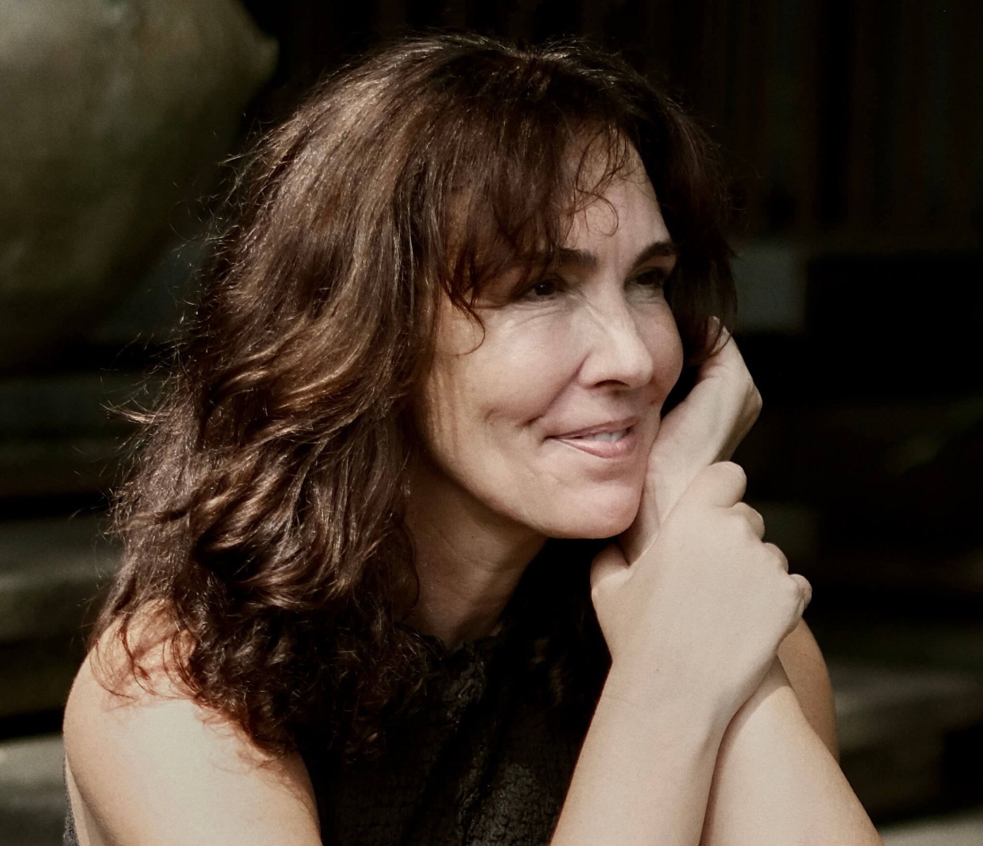 Dr. Jennifer Kai Lynne, founder of YOULAB, sitting in nature